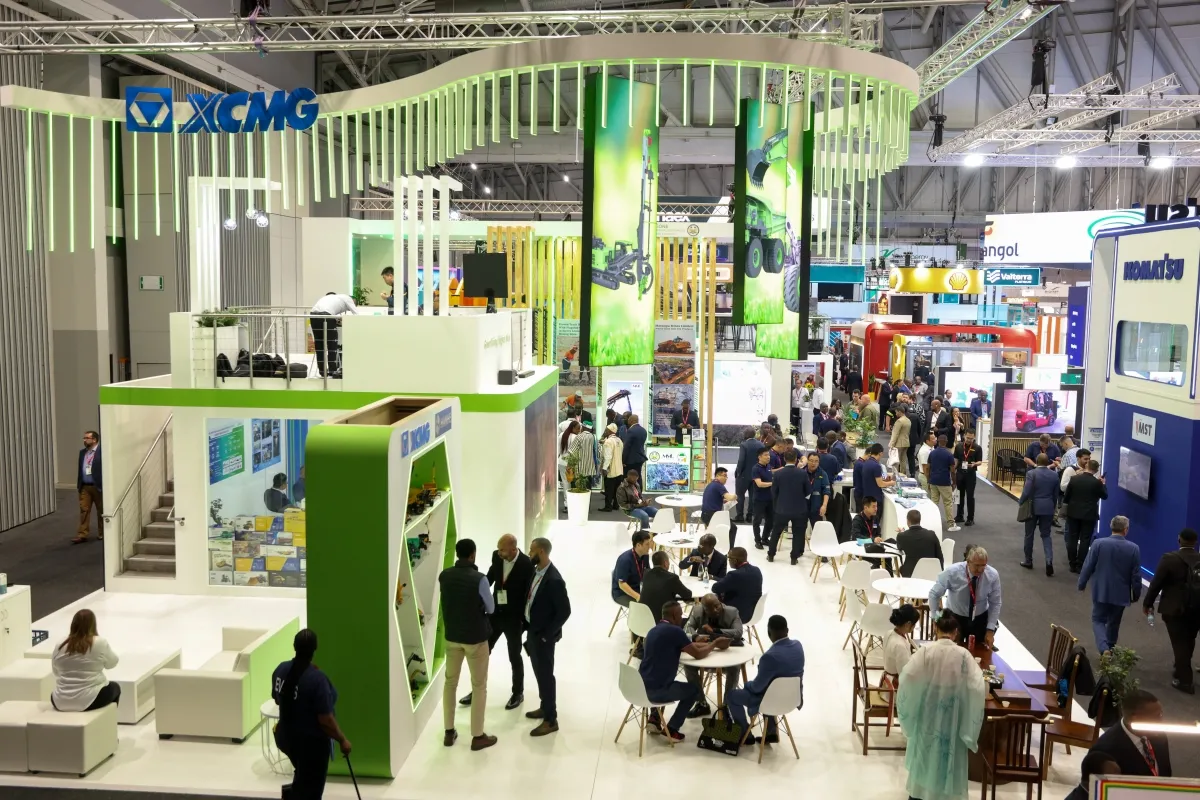 Exhibitors and attendees networking across the Mining Indaba exhibition floor