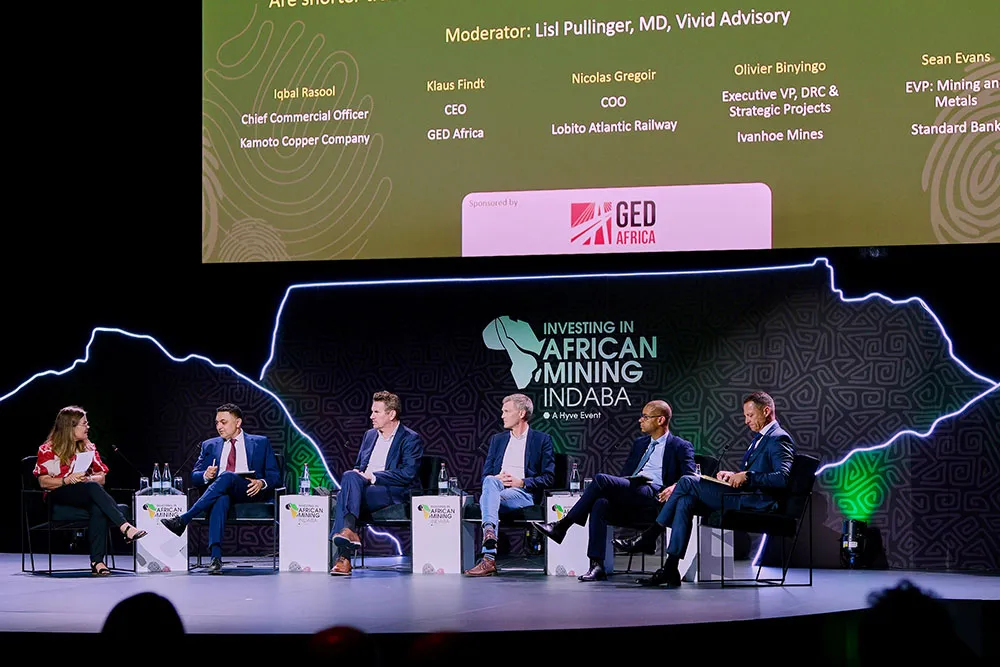 Industry leaders share insights during a conference panel at Mining Indaba