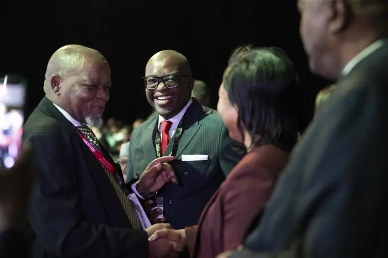 Government and industry leaders networking at Mining Indaba