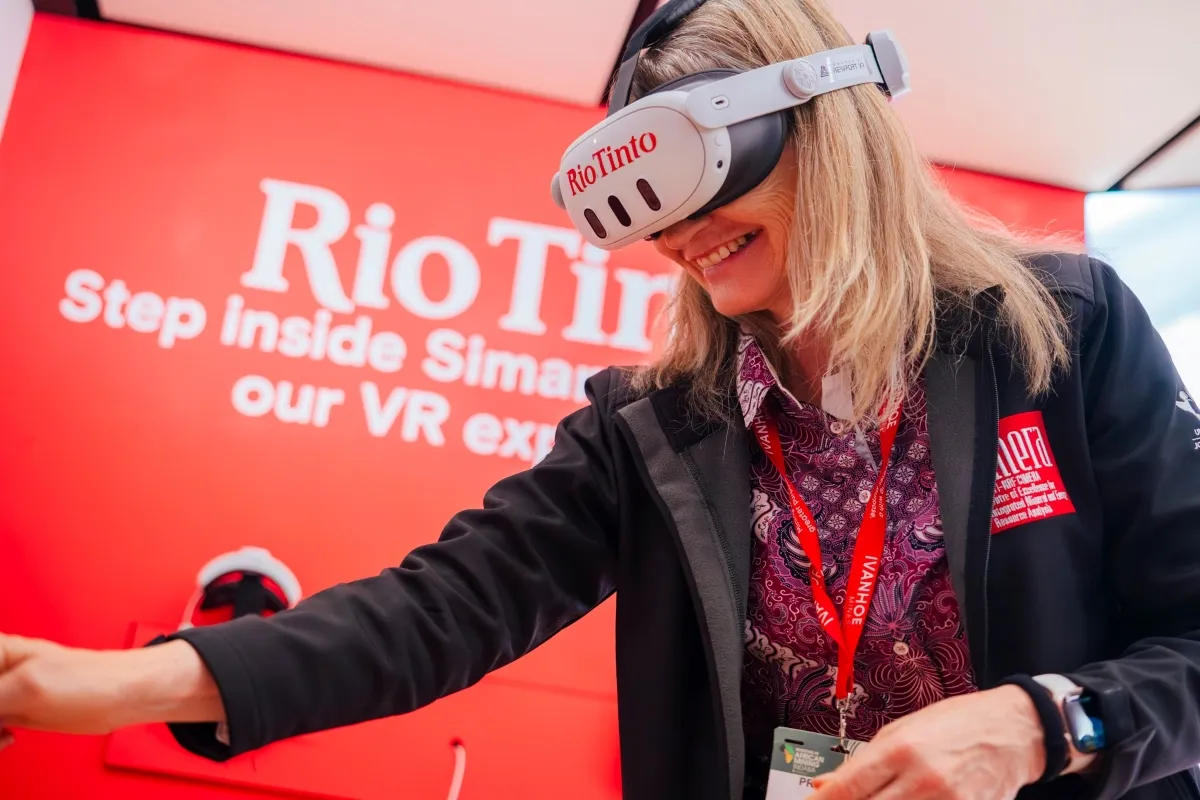 Delegate experiencing virtual reality at the Rio Tinto exhibition stand