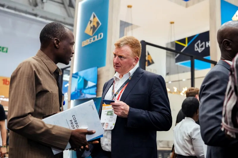 Mining industry professionals meeting on the exhibition floor