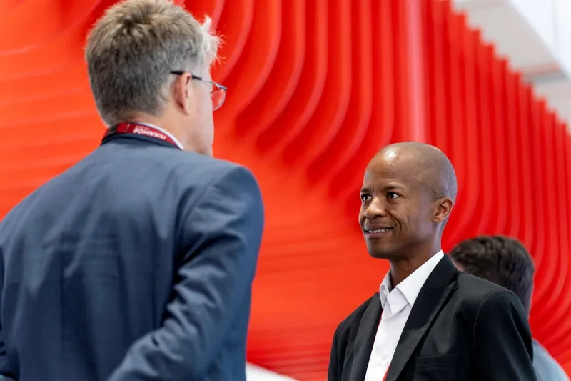 Attendees networking at Mining Indaba