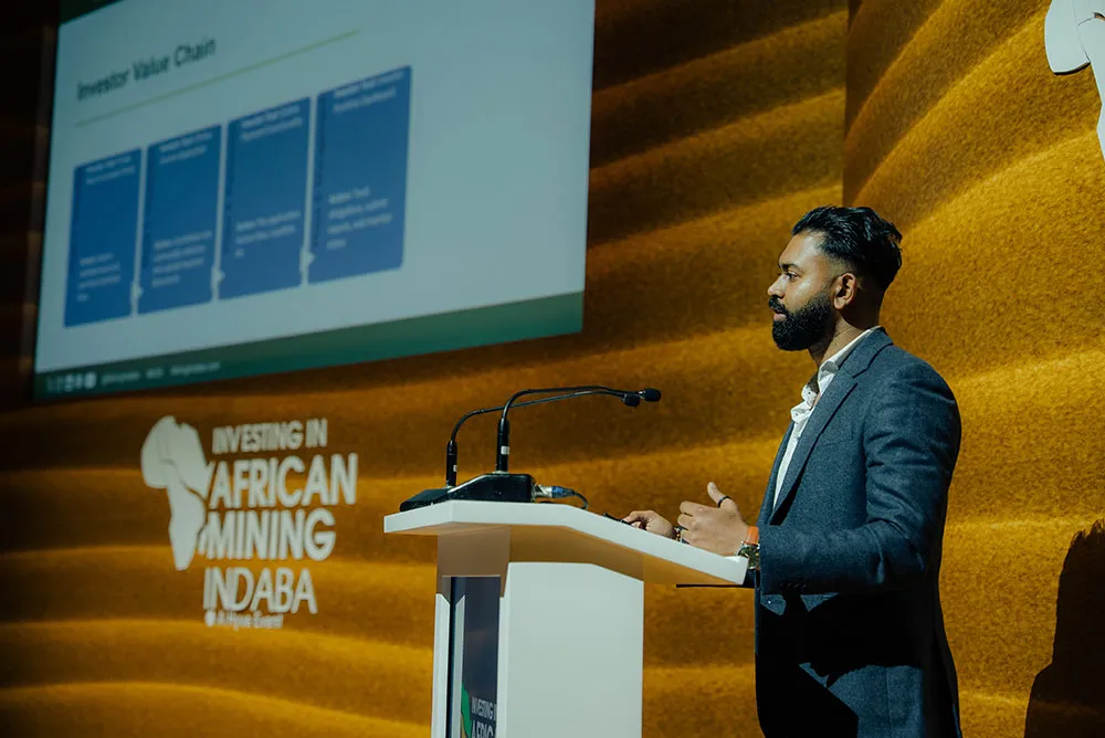 Speaker presenting during a Mining Indaba conference session