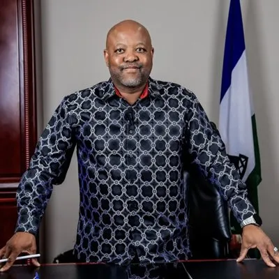 Hon. Mohlomi Moleko