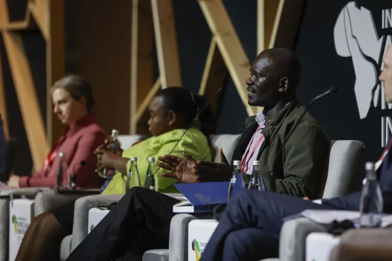 Speaker contributing to a panel discussion at Investing in African Mining Indaba